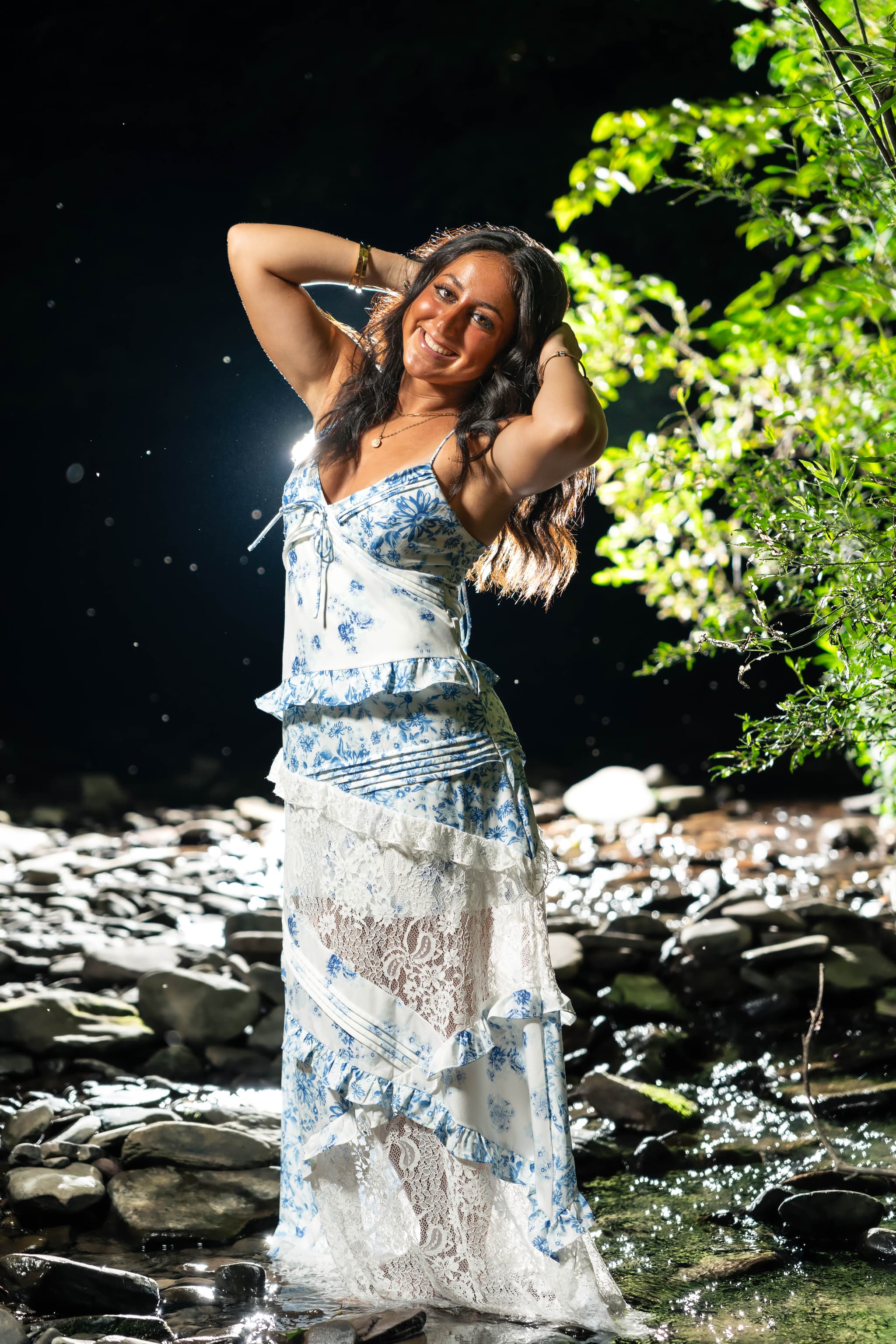 Mackenzie C. senior portrait in the creek at Ives Run, PA